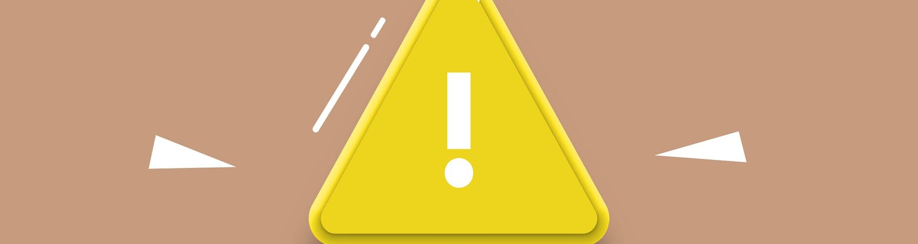 cutout paper composition of yellow signboard with exclamation mark